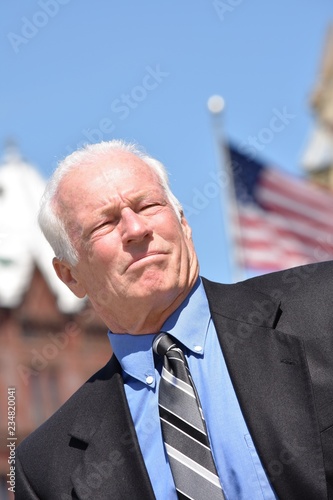 Serious Adult Business Executive Wearing Tie photo