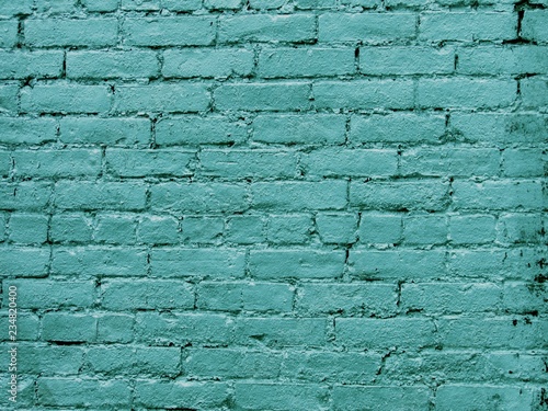 Rough brick wall texture in turquoise color