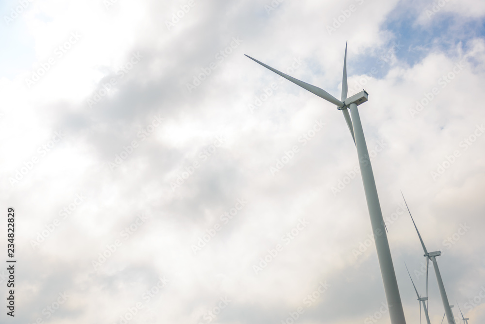 Windmill turbine field for electric production at Khao Kho, Petchabun, Thailand Windmill turbine field for electric production at Khao Kho, Petchabun, Thailand