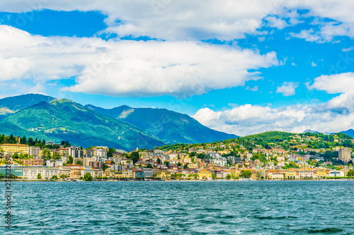 Old town of Lugano facing the Lugano lake in Switzerland photo