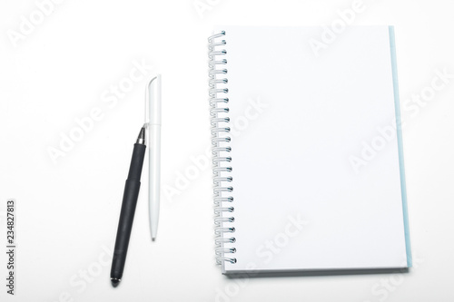 notepad notebook and ball pont pen isolated on white background © fotofabrika