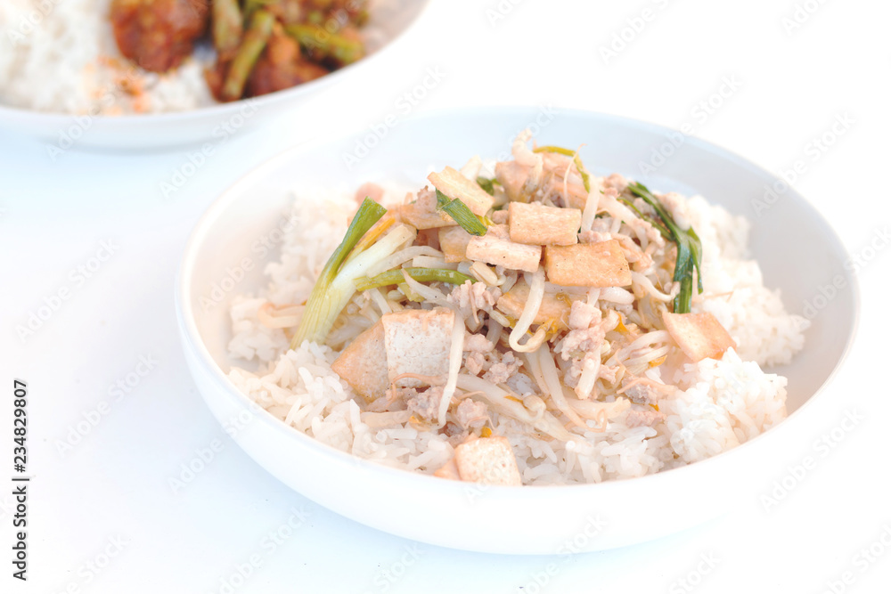 Rice topped .Stir fried bean sprouts with tofu, Thai food Rice topped .Stir fried bean sprouts with tofu, Thai food