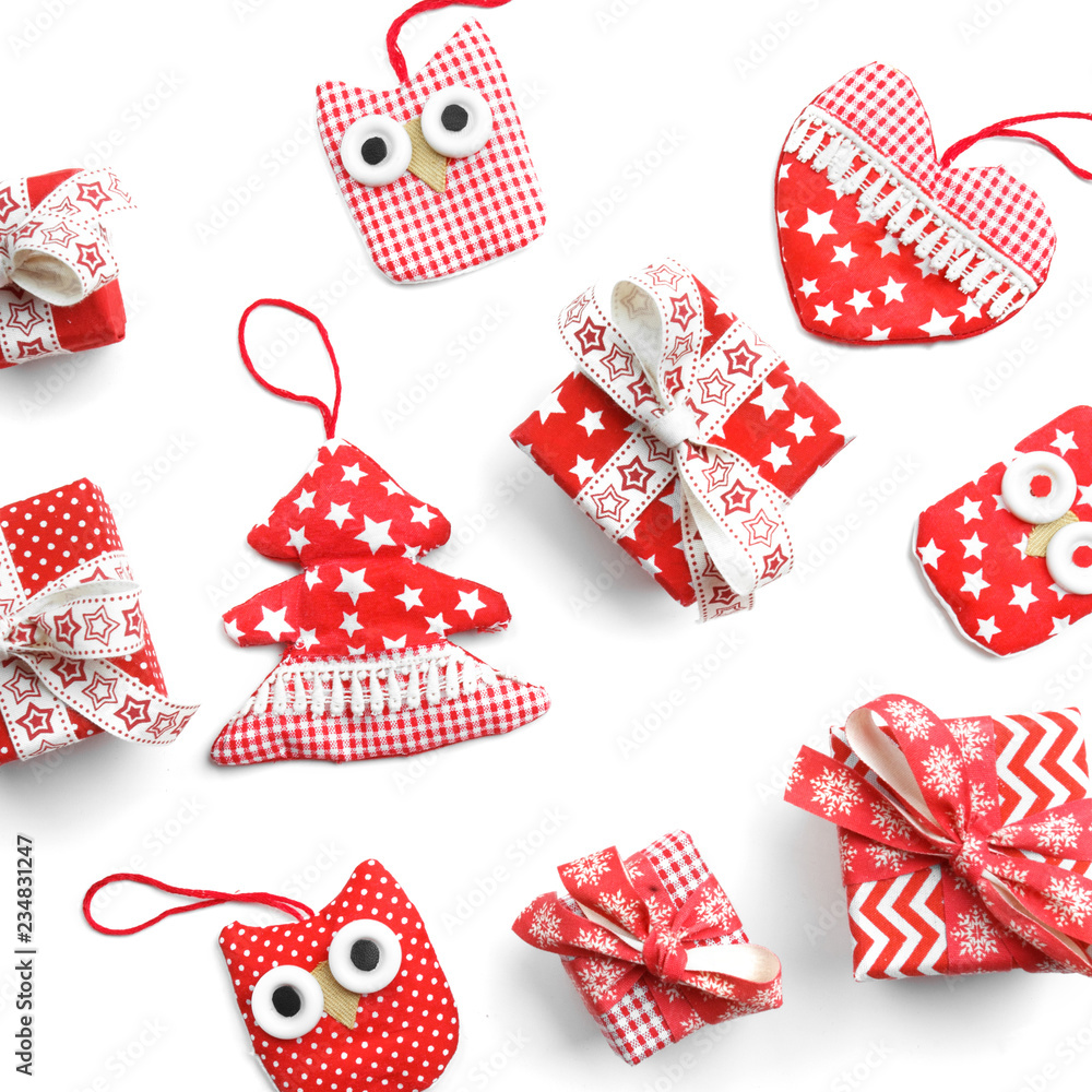 Fototapeta premium Flat lay. Christmas, gifts, Christmas boxes and Christmas toys on a white table