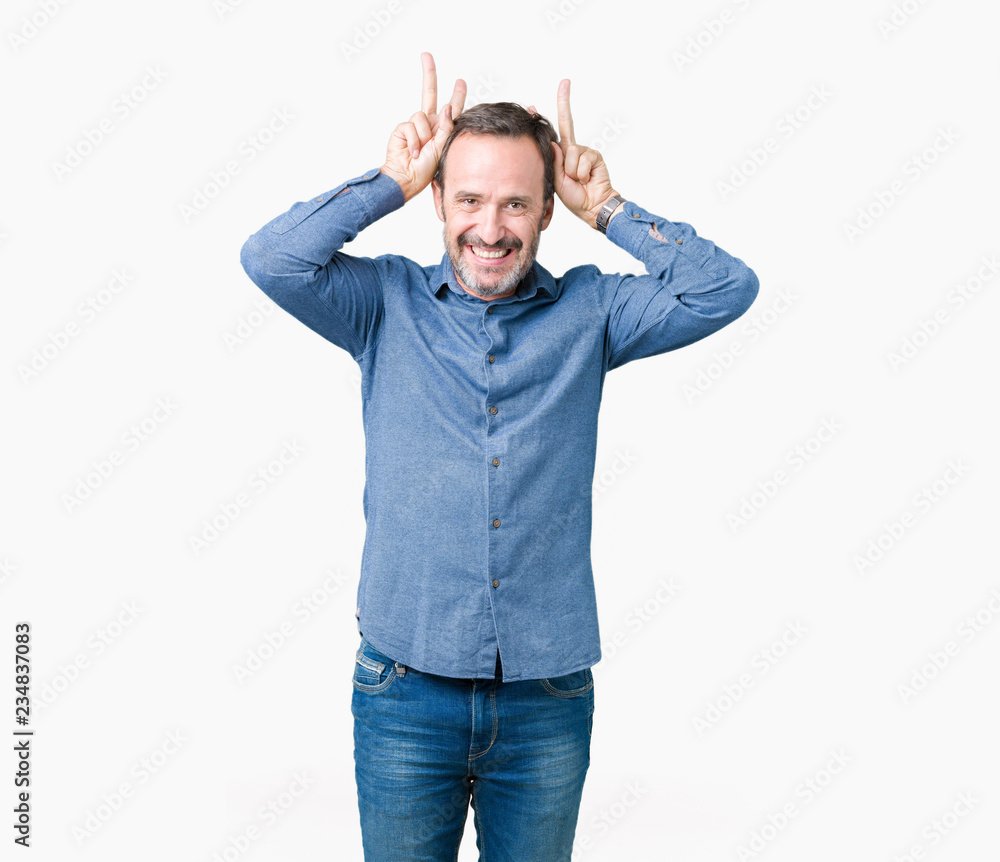 Handsome middle age elegant senior man over isolated background Posing funny and crazy with fingers on head as bunny ears, smiling cheerful Handsome middle age elegant senior man over isolated background Posing funny and crazy with fingers on head as bunny ears, smiling cheerful