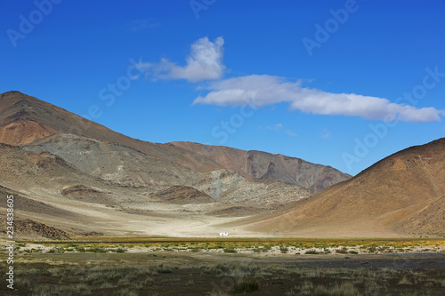 Beautiful views of the steppe and mountains with sky blue or clouds of Western Mongolia