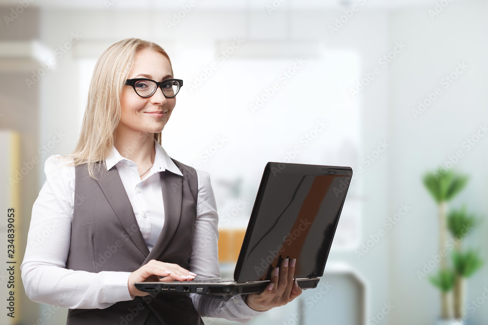 The concept of business, technology, the Internet and the network. Business woman is working on computer The concept of business, technology, the Internet and the network. Business woman is working on computer