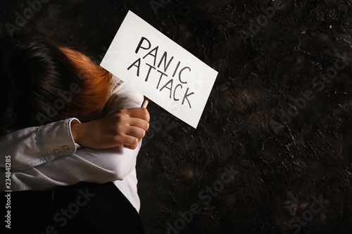 Depressed woman holding pap...