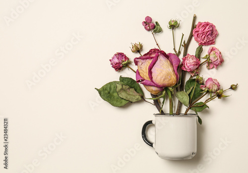 Wallpaper Mural Beautiful dry roses with cup on white background Torontodigital.ca