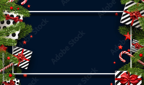 New Year and Christmas card with fir branches, gifts, candy canes and stars. Top view card.