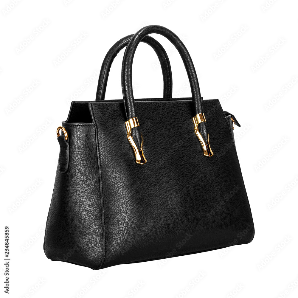 Black leather women bag with gold fittings isolated on a white background. Side view Black leather women bag with gold fittings isolated on a white background. Side view