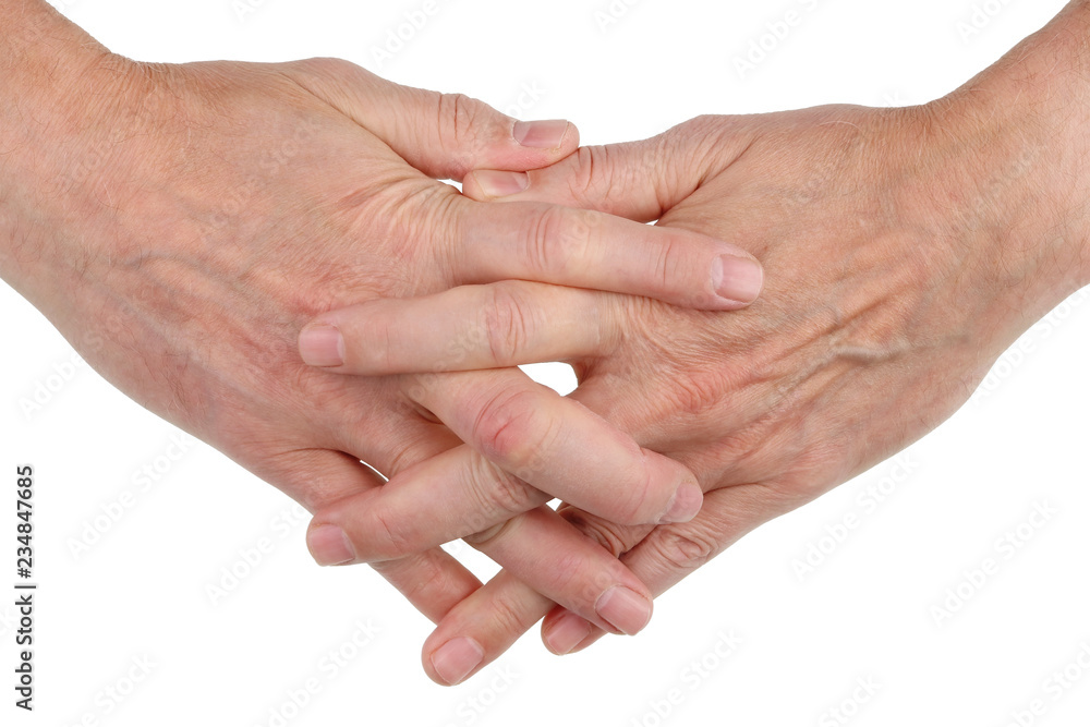 Men's hands are woven together with fingers as a symbol of friendship and love. Isolated Men's hands are woven together with fingers as a symbol of friendship and love. Isolated