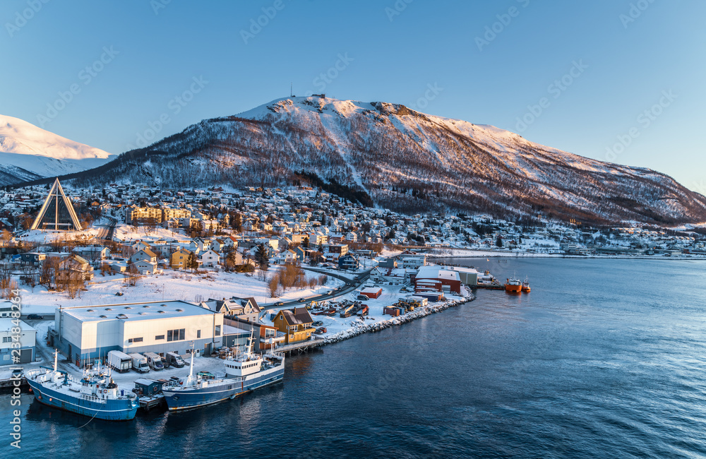 Aerial view to the city of Tromso and it's marina in winter, North Norway. - obrazy, fototapety, plakaty 