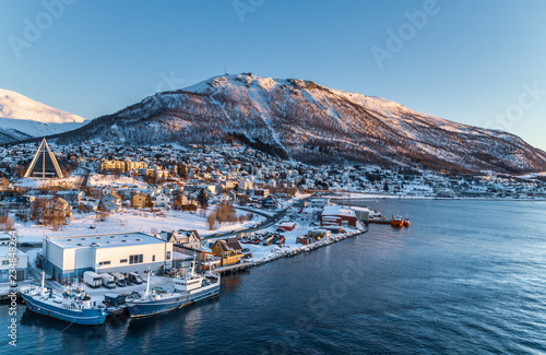 Aerial view to the city of Tromso and it's marina in winter, North Norway.