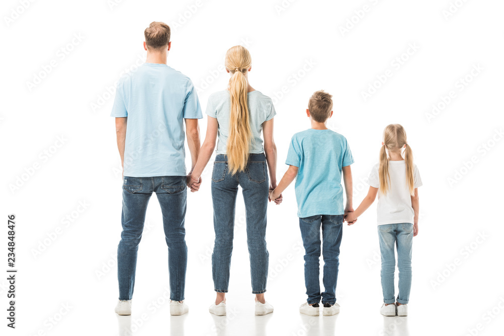 Fototapeta premium Back view of family standing and holding hands isolated on white