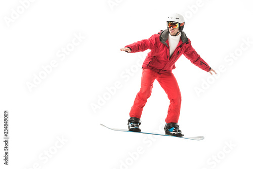 adult man in ski clothes snowboarding isolated on white