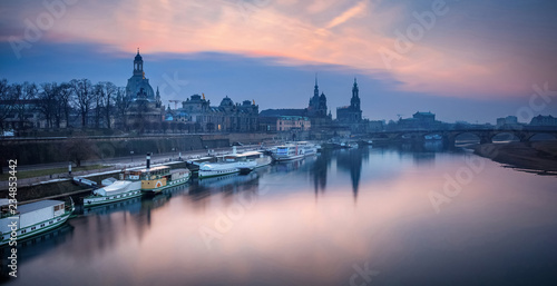 Dresden. Panoramic image of Dresden  Germany during sunset with Elbe River in the foreground.