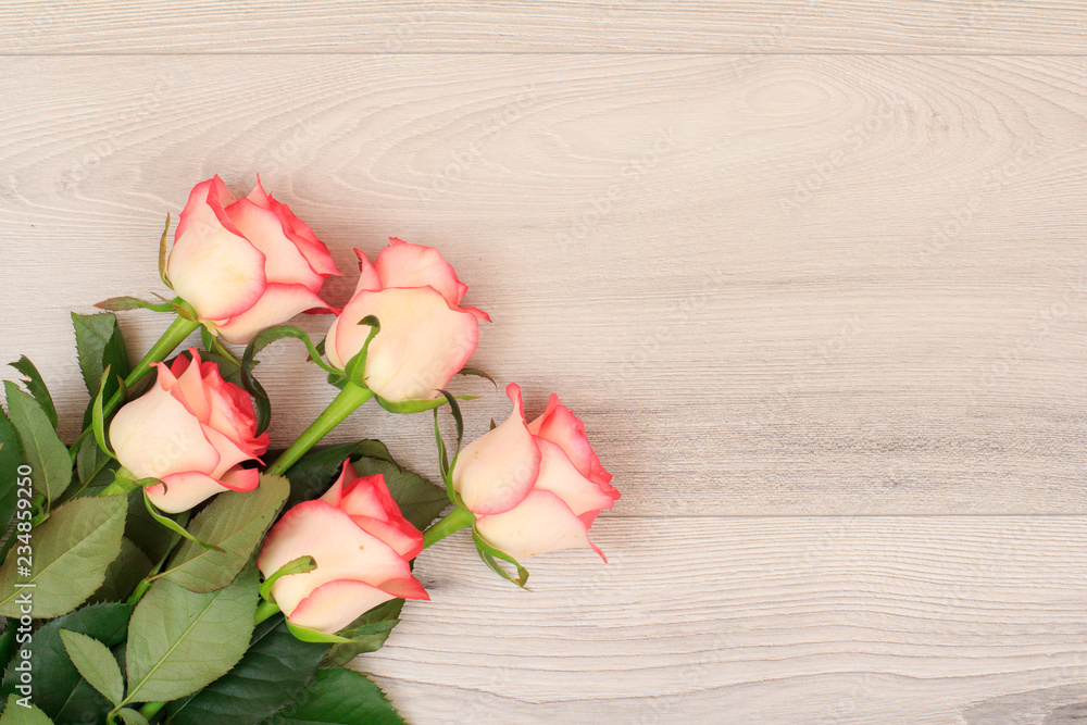 Beautiful bouquet of pink roses on wooden desk. Beautiful bouquet of pink roses on wooden desk.