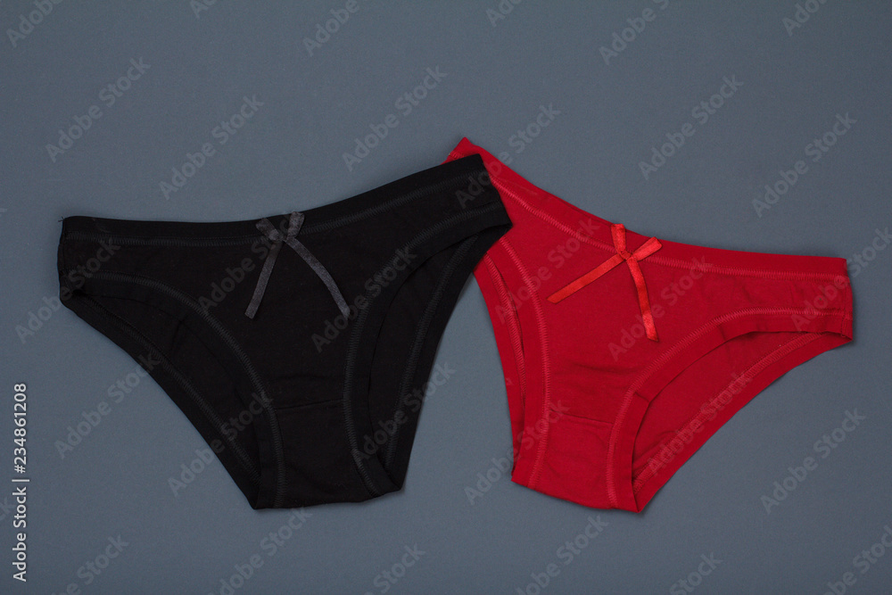 Beautiful women's cotton panties on gray background. Beautiful women's cotton panties on gray background.