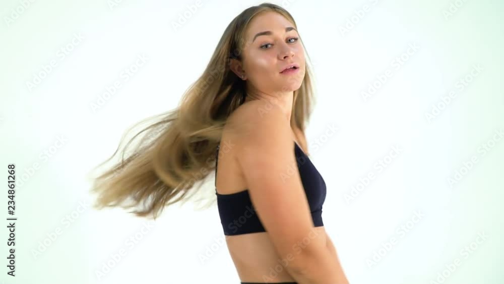 Flirty moves, turns and looks of young athletic blonde Flirty moves, turns and looks of young athletic blonde