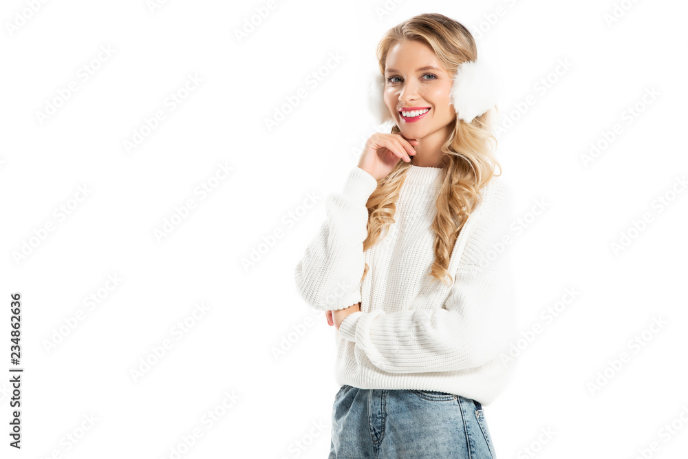 happy beautiful young woman in winter earmuffs and sweater isolated on white happy beautiful young woman in winter earmuffs and sweater isolated on white