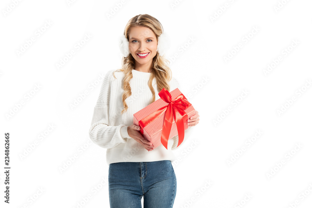 beautiful smiling young woman in winter outfit holding gift isolated on white beautiful smiling young woman in winter outfit holding gift isolated on white