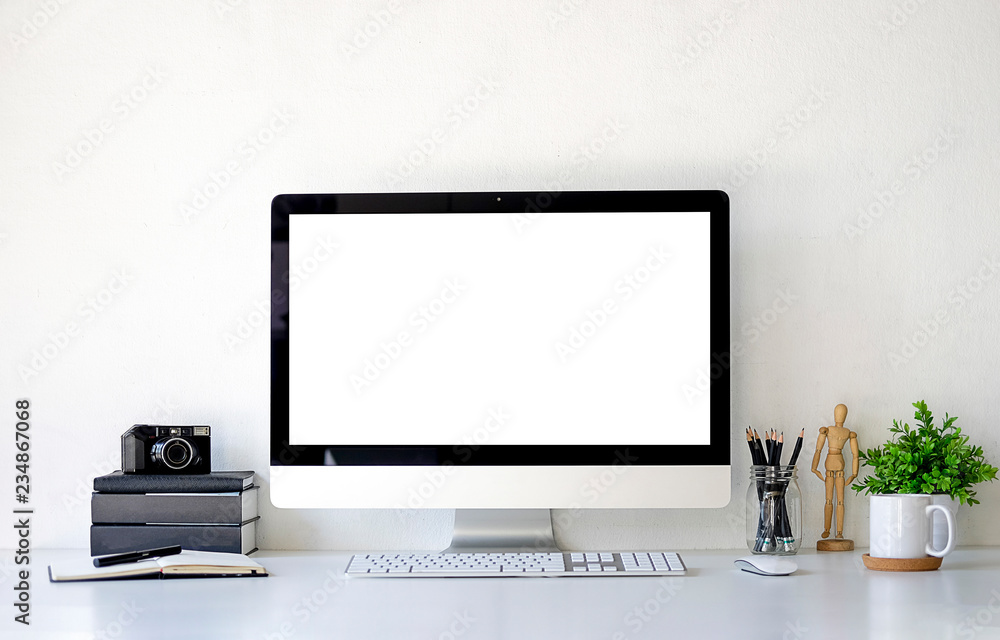 Fototapeta premium Office desk Work space stuff with notepad, laptop and coffee cup mouse notepad shot.