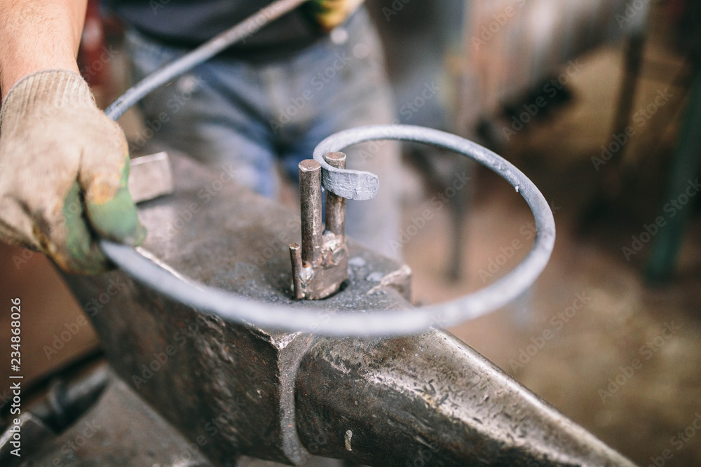  blacksmith working with metal