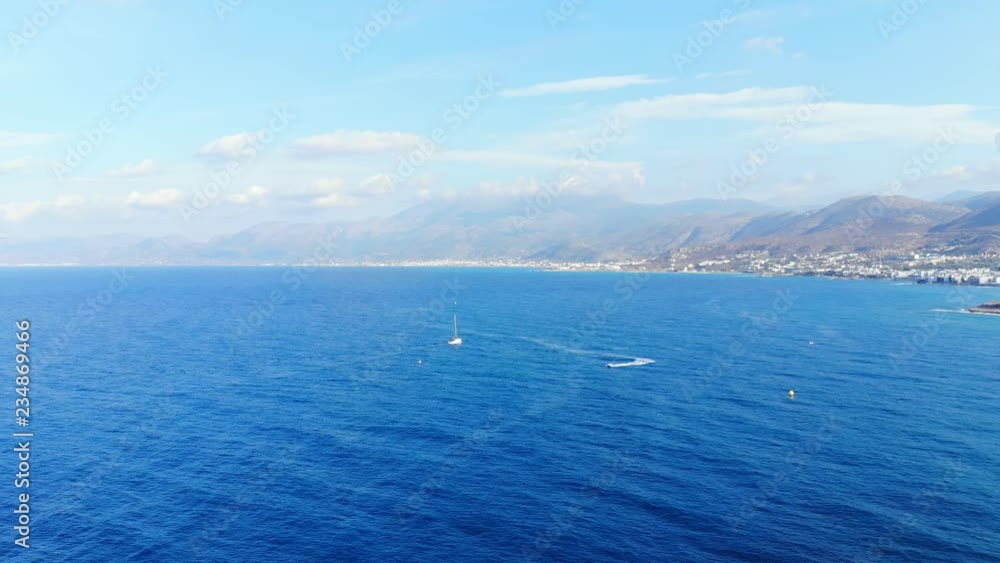 Aerial panorama on blue sea, yacht, water bike, Crete, Greece Aerial panorama on blue sea, yacht, water bike, Crete, Greece