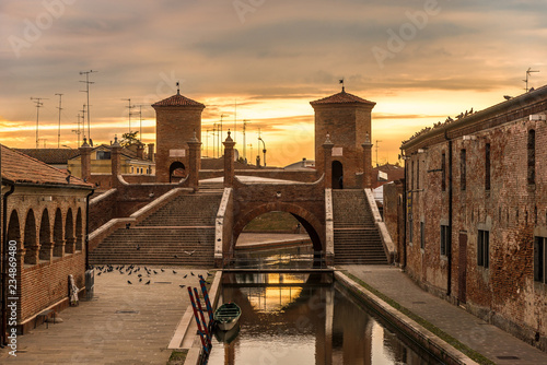 Morning view at the Trepponti bridge in Comacchio - Italy photo