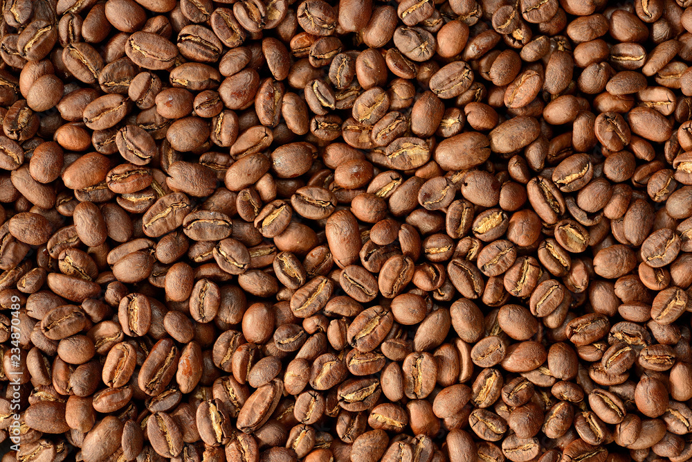 Roasted brown coffee beans pattern, background, top view