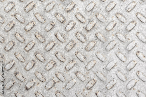 Steel sheet with notches - gray vintage metal abstract light coloured background, texture close-up