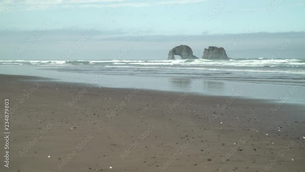 Rockaway Beach Twin Rocks, Oregon. USA. 4K UHD. Twin Rocks off shore at Rockaway Beach, Oregon. United States. 4K UHD. Rockaway Beach Twin Rocks, Oregon. USA. 4K UHD. Twin Rocks off shore at Rockaway Beach, Oregon. United States. 4K UHD.