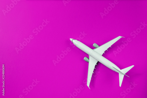 Image of airplane isolated on empty purple background