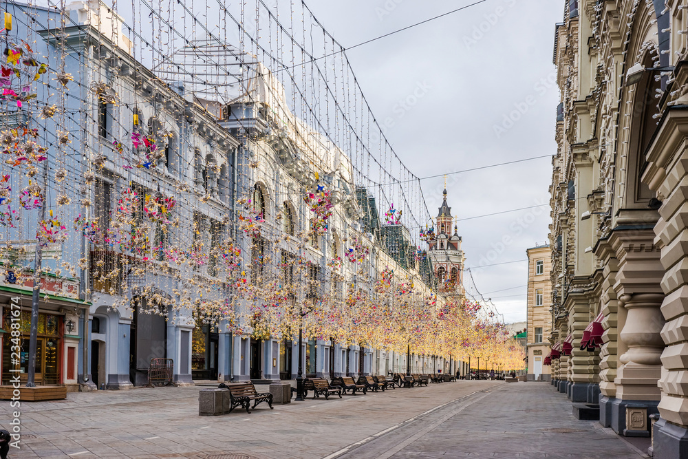 Nikolskaya street decorated by festive garlands. Moscow, Russia.