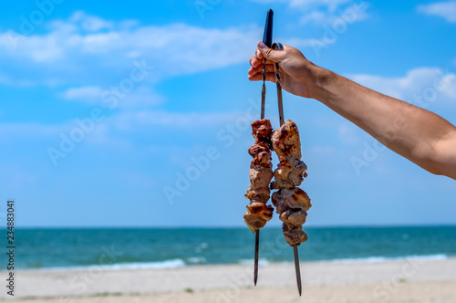Barbecue on the beach at summer