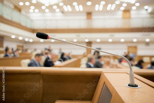 Conference room or seminar meeting room in business event. Session of Government. Academic classroom training course in lecture hall. blur abstract background. working in modern bright office indoor