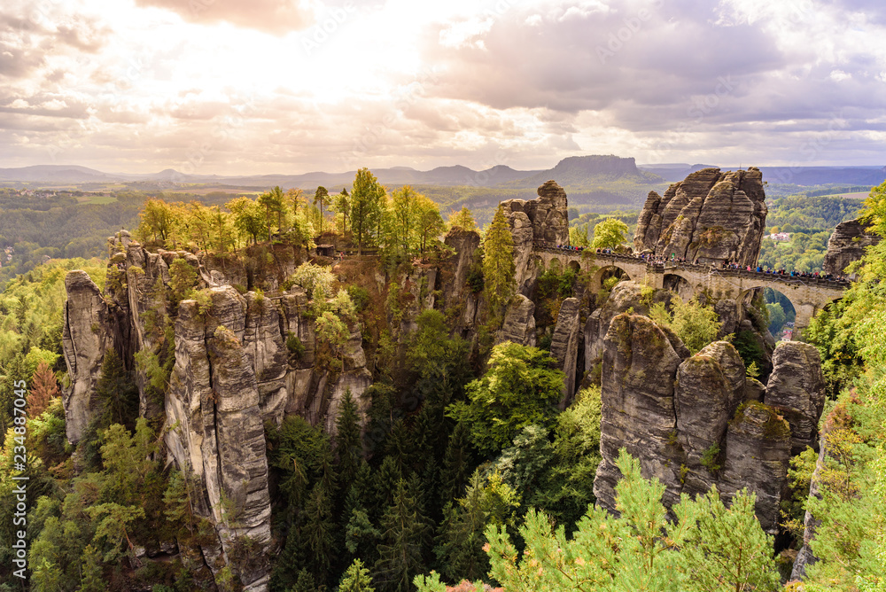 Panorama view on the Bastei bridge. Bastei is famous for the beautiful rock formation in Saxon Switzerland National Park, near Dresden and Rathen - Germany. Popular travel destination in Saxony.