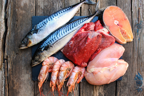 Obraz na plátně Healthy food of animal origin on old wooden background