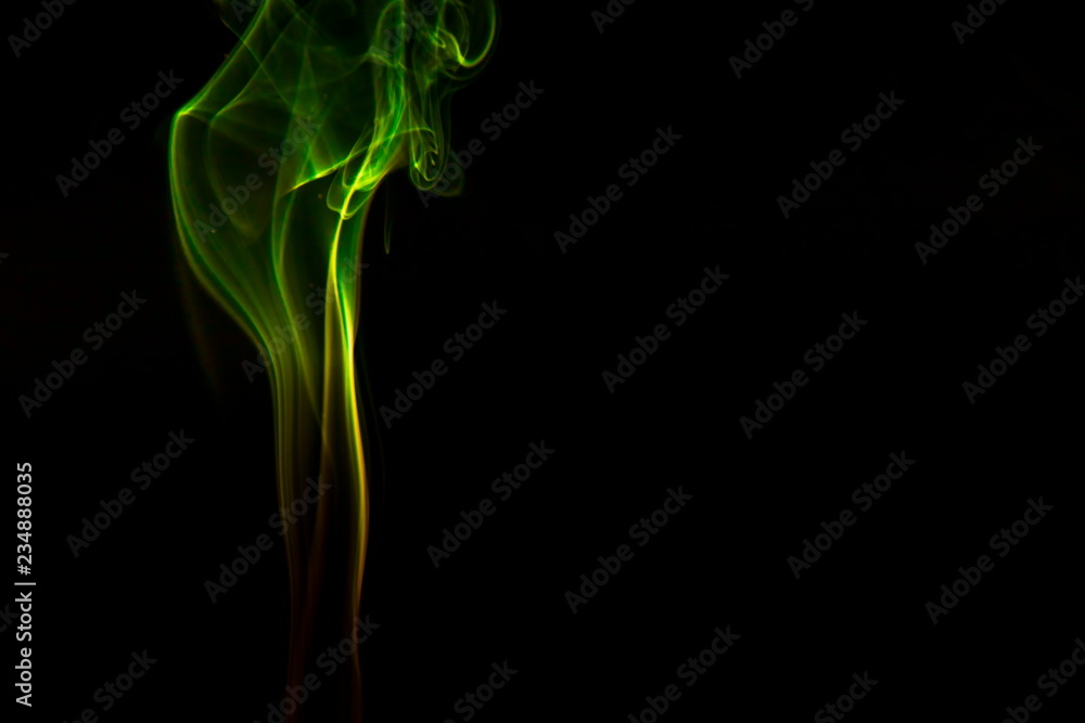 Colored smoke on black background Colored smoke on black background