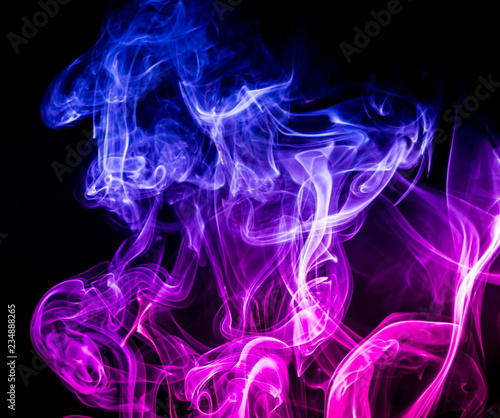 Colored smoke on black background