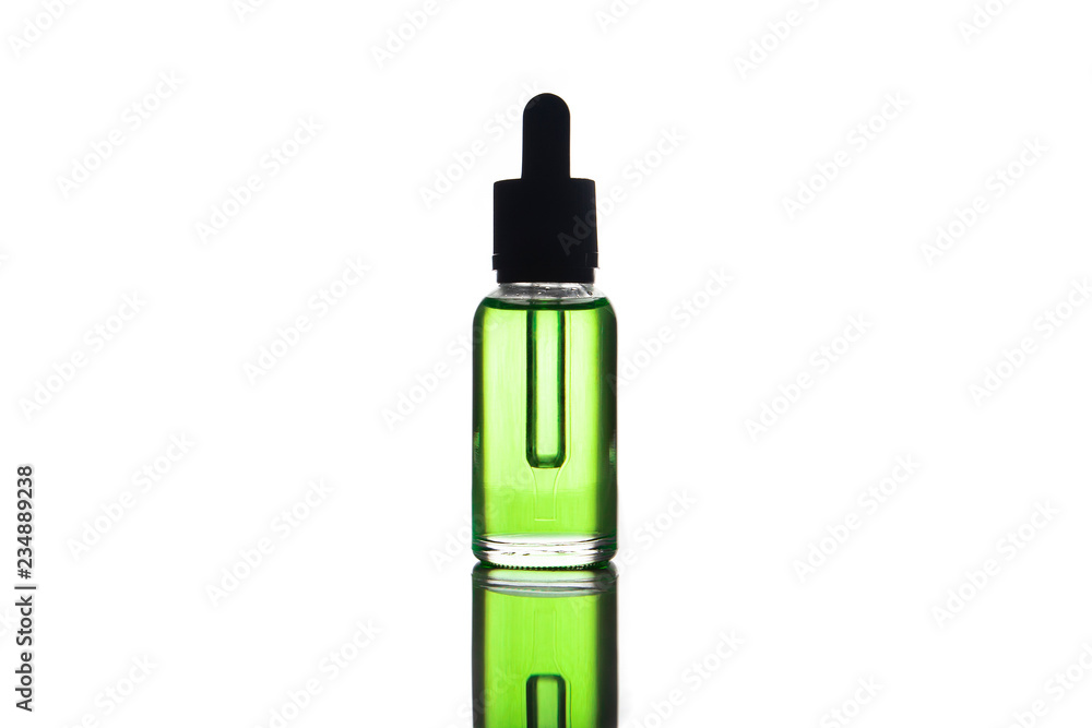blank mock up advertising of the green e-liquid, e-juice in the bottle isolated on the white background with copy space (flacon with pipette). blank mock up advertising of the green e-liquid, e-juice in the bottle isolated on the white background with copy space (flacon with pipette).