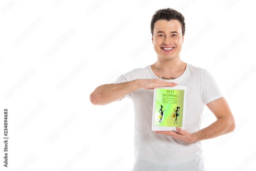handsome man holding digital tablet with shopping app on screen isolated on white handsome man holding digital tablet with shopping app on screen isolated on white