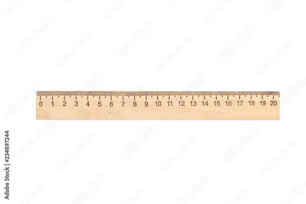 A wooden ruler on a white background. A wooden ruler on a white background.