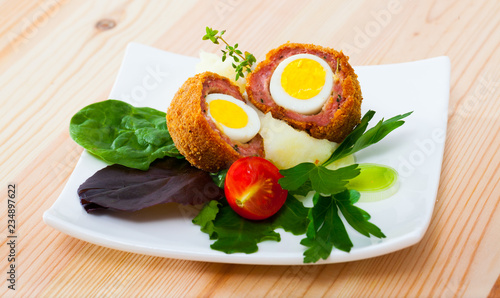 Scotch eggs with vegetables