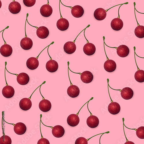 christmas red glitter balls decoration, graphic manipulation in cherries food, funny concept, pastel pop background