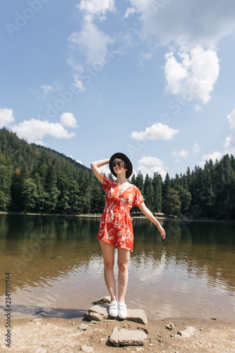 girl traveler near a mountain lake © Victoriya Bulyha