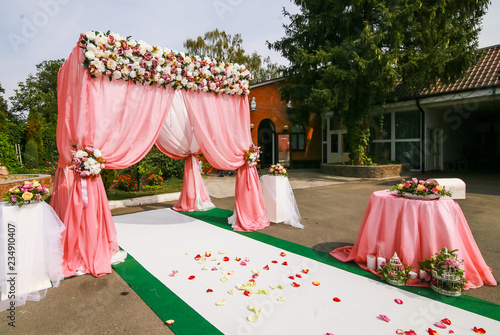 colorful decoration red wedding arch for a European wedding