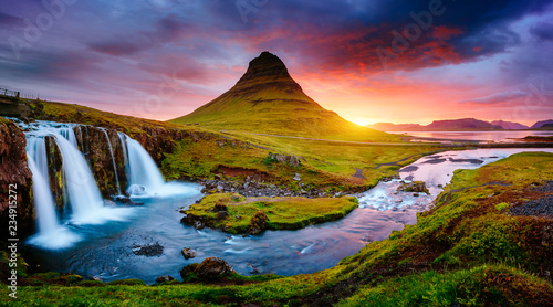 The Kirkjufellsfoss waterfall the coast of Snaefellsnes peninsula. Location Iceland.