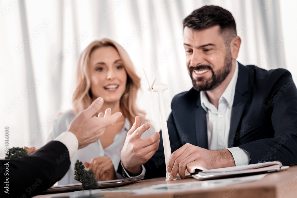 Alert businesspeople sitting at the table Alert businesspeople sitting at the table