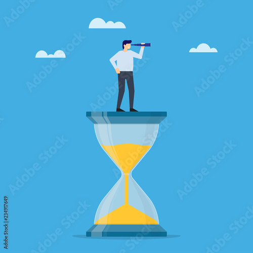 Businessman with monocular standing on sandglass